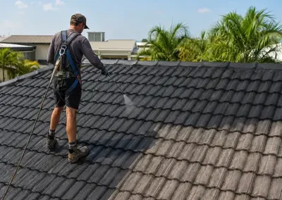 Tile roof restoration work on a residential home in Darwin