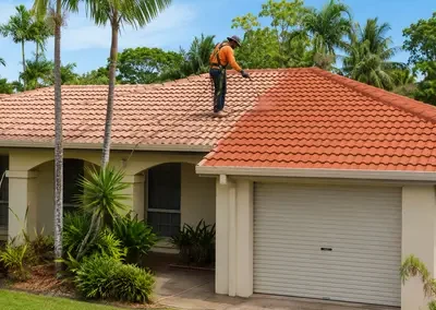 Terracotta tiled roof undergoing restoration work in Darwin