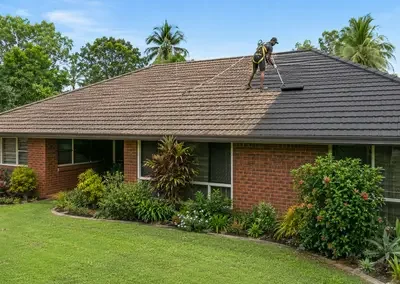 Terracotta tiled roof undergoing restoration work in Darwin