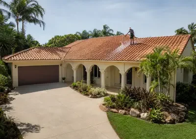 Professional pressure cleaning of a tiled roof in Darwin